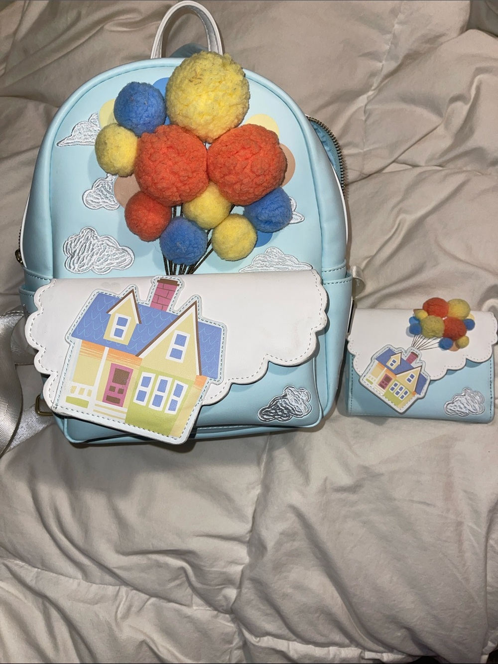 Loungefly Light Blue Kids Balloon Pom-Pom Mini Backpack and wallet
